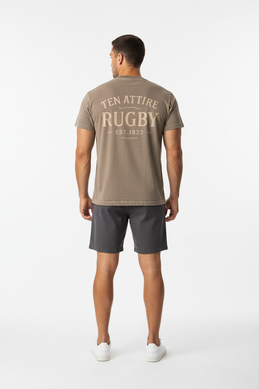 Full body back view of male model wearing brown Ten Attire Rugby tee
