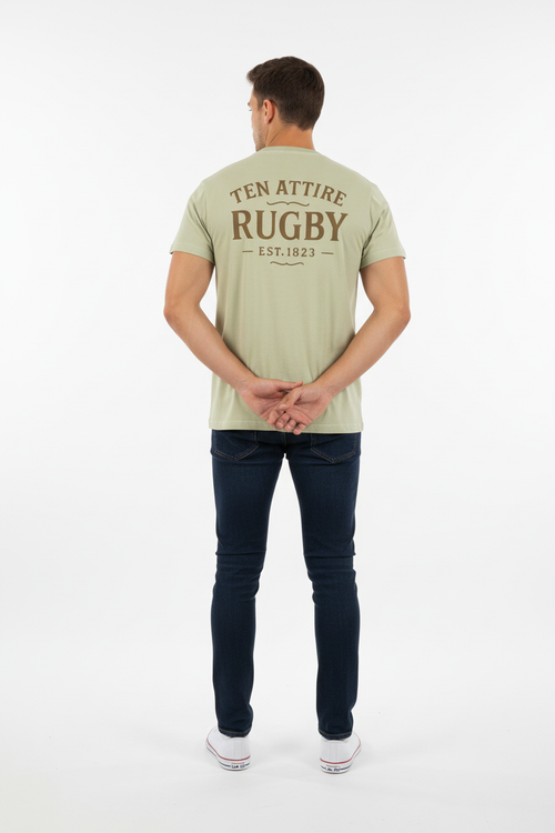 Full body back view of male model wearing sage green Ten Attire Rugby tee