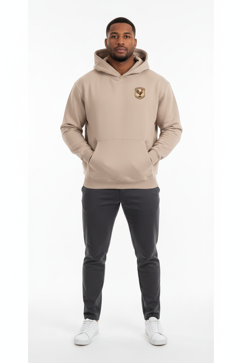 Full body front view of male model wearing beige French rugby rooster hoodie