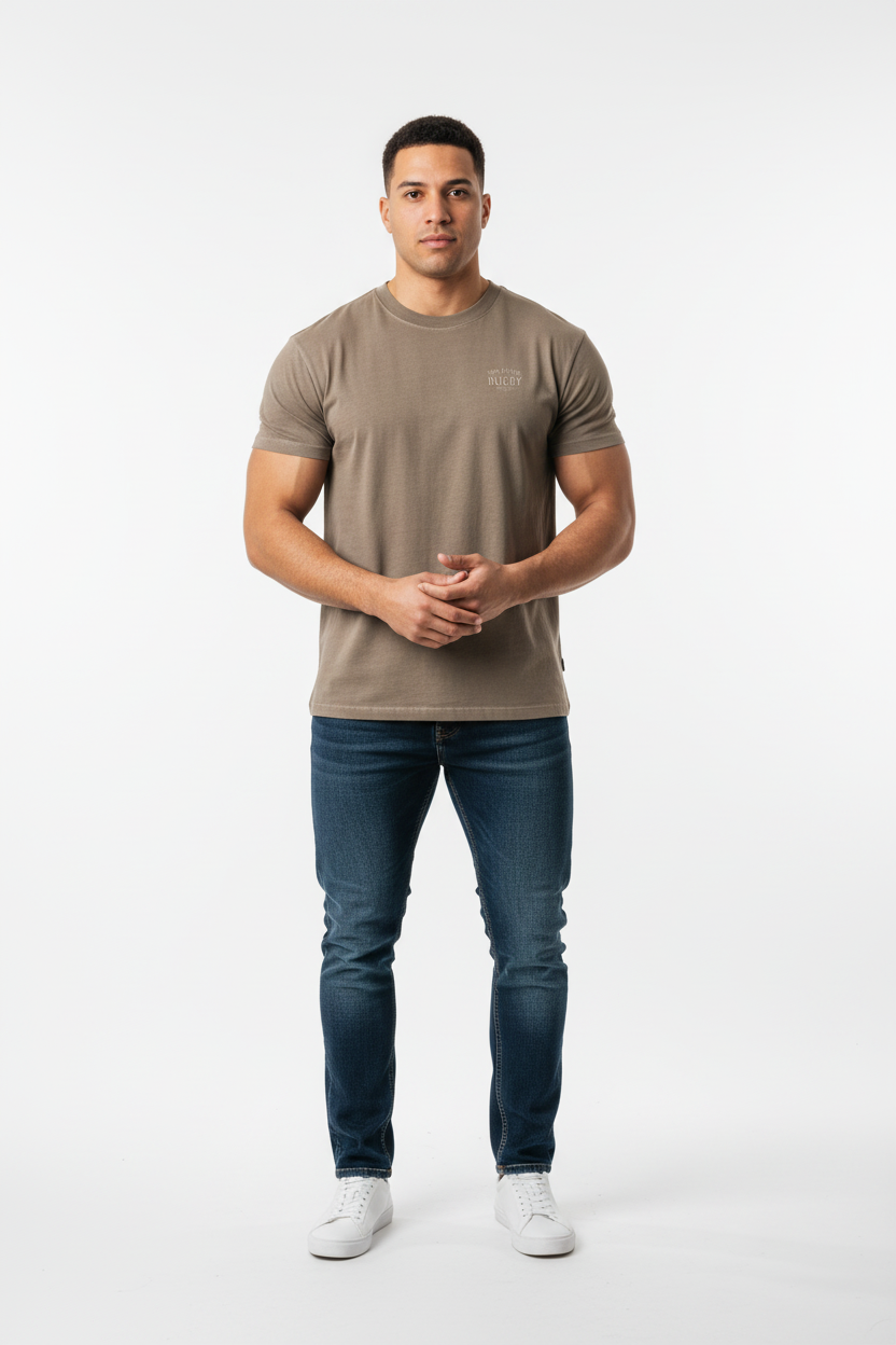 Full body front view of male model wearing brown Ten Attire Rugby tee