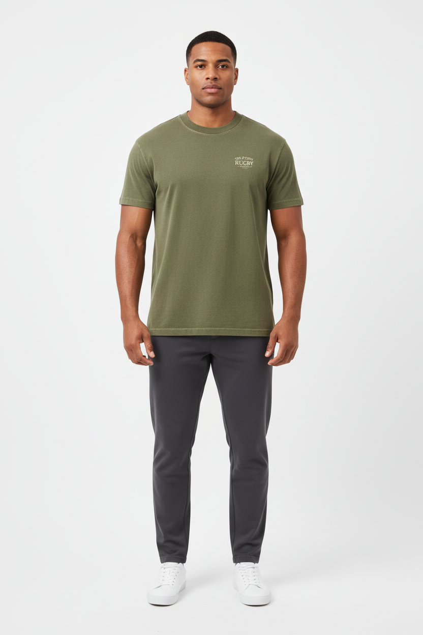 Full body front view of male model wearing olive green Ten Attire Rugby tee