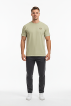 Full body front view of male model wearing sage green Ten Attire Rugby tee